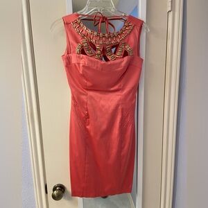 Orange dress with gold bead accents
